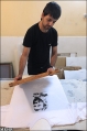حکاکی نقش شهدا بر اندام جوانان ایرانی